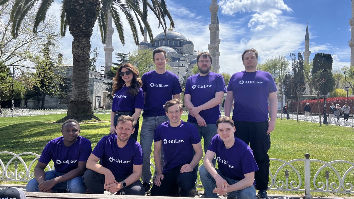 The GitLaw team in matching shirts in front of the Blue Mosque, Istanbul