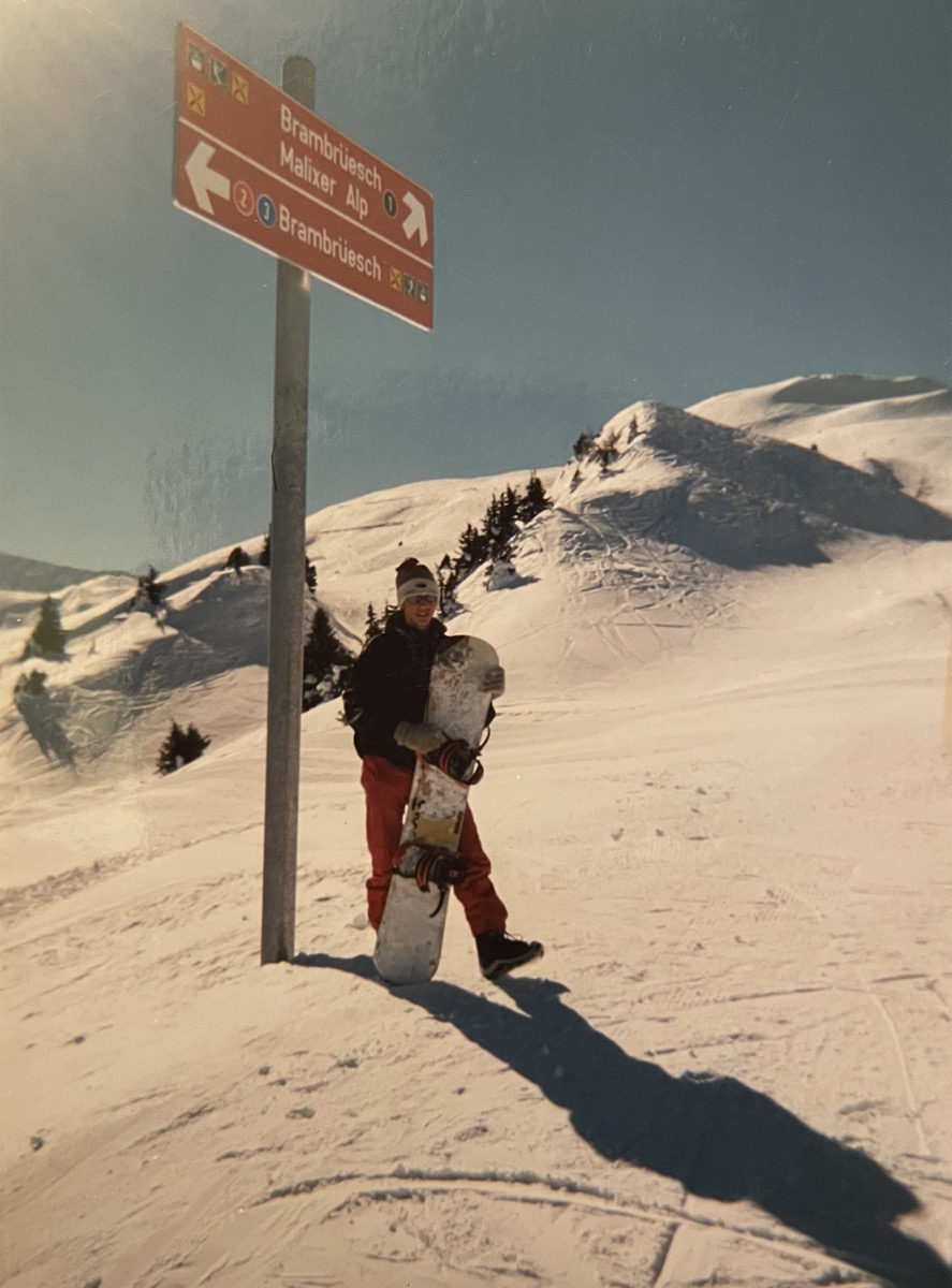 A young Nick snowboarding at Brambrüesch in the Swiss Alps